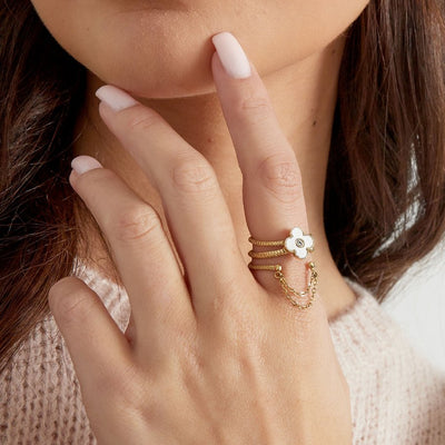 Ring with flower and chain