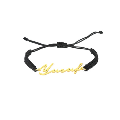 SIGNATUR ARMBAND MIT SCHWARZES SEIL